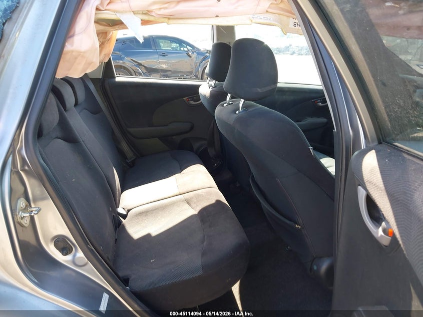 2009 Honda Fit VIN JHMGE88479S003354 IAAI salvage auction — ROLLOVER, Salvage (Texas), sold $350 on 2026-07-11 (photo 8)