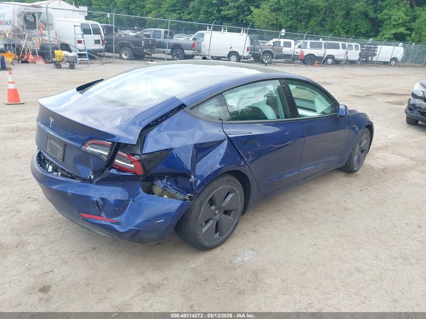 2023 Tesla Model 3 VIN 5YJ3E1EA1PF490384 IAAI salvage auction — RIGHT REAR, Salvage Title, sold $6,900 on 2026-07-30 (photo 4)