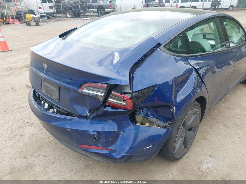 2023 Tesla Model 3 VIN 5YJ3E1EA1PF490384 IAAI salvage auction — RIGHT REAR, Salvage Title, sold $6,900 on 2026-07-30 (photo 6)