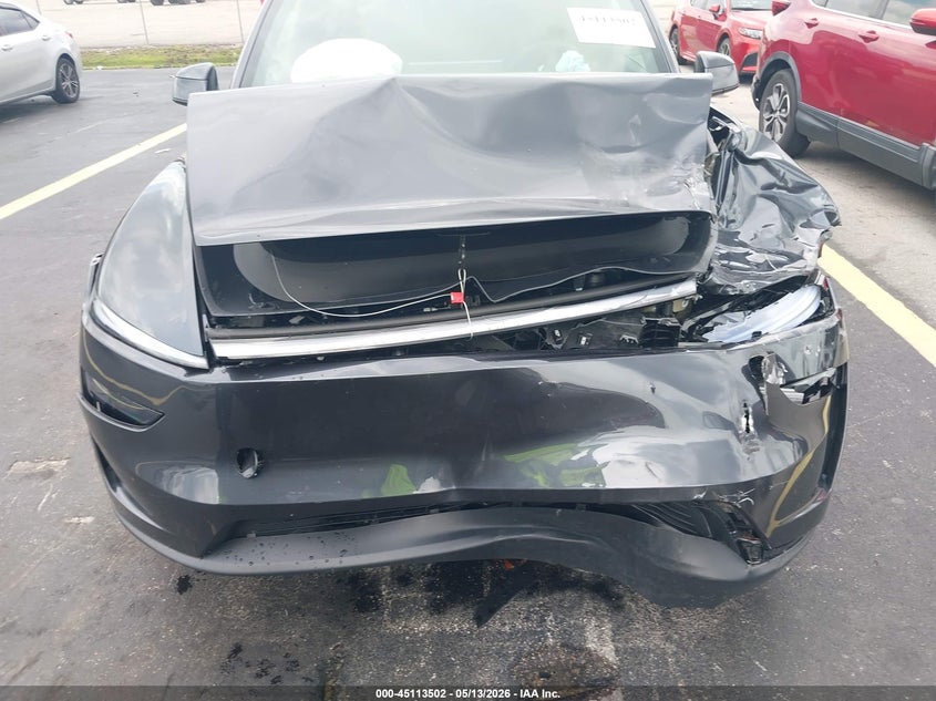 2026 Tesla Model y VIN 7SAYGDED5TA647114 IAAI salvage auction — FRONT END, Rebuildable (Florida), sold $16,050 on 2026-07-09 (photo 6)