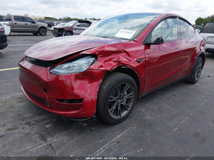 2025 Tesla Model y VIN 7SAYGDED1SA349206 IAAI salvage auction — SIDE, Rebuildable (Florida), sold $11,050 on 2026-07-16 (photo 2)