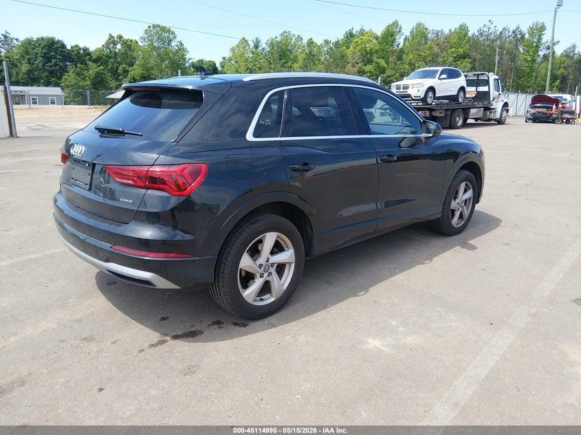 2020 Audi Q3 VIN WA1AECF39L1021463 IAAI salvage auction — LEFT SIDE, Salvage (Mississippi), sold $4,300 on 2026-08-15 (photo 4)