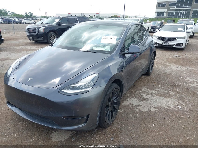 2021 Tesla Model y VIN 5YJYGDED6MF123312 IAAI salvage auction — SIDE, Salvage (Texas), sold $8,300 on 2026-07-31 (photo 2)