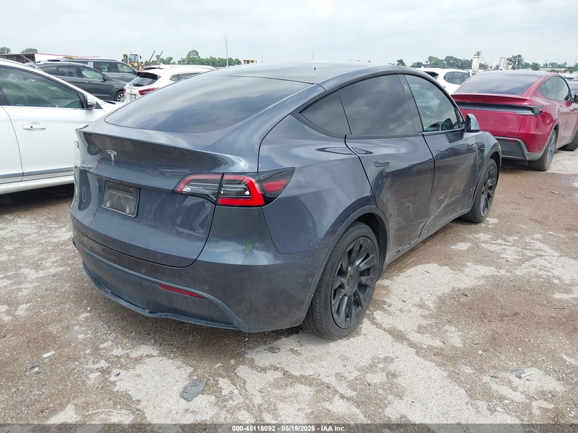 2021 Tesla Model y VIN 5YJYGDED6MF123312 IAAI salvage auction — SIDE, Salvage (Texas), sold $8,800 on 2026-07-31 (photo 4)