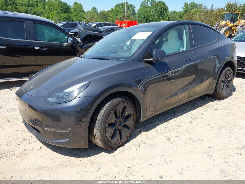 2024 Tesla Model y VIN 7SAYGAEEXRF106806 IAAI salvage auction — SIDE, Salvage (North Carolina), sold $13,250 on 2026-07-16 (photo 2)