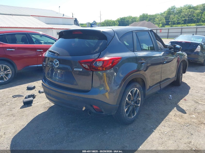 2016 Mazda Cx-5 VIN JM3KE4DY1G0639460 IAAI salvage auction — ROLLOVER, Salvage (Illinois), sold $1,125 on 2026-07-27 (photo 4)