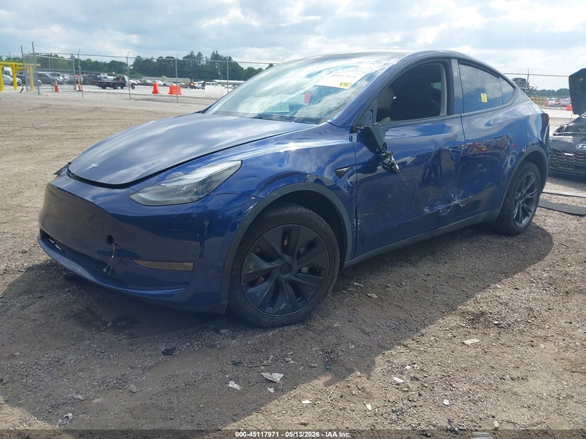 2025 Tesla Model y VIN 7SAYGDEE4SA346938 IAAI salvage auction — SIDE, Salvage (South Carolina), sold $7,500 on 2026-07-09 (photo 2)