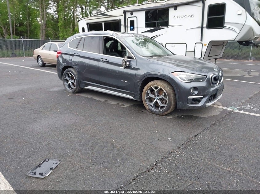 2018 BMW X1 VIN WBXHT3C33J5K27627 IAAI salvage auction — RIGHT SIDE, Mv-907A (New York), sold $875 on 2026-07-30 (photo 1)