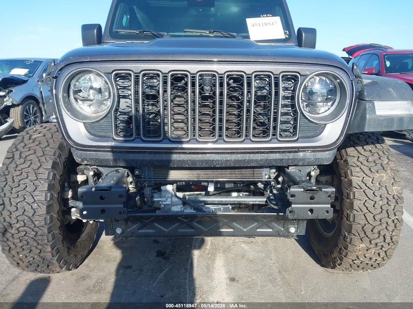 2025 Jeep Wrangler / VIN 1C4PJXFG2SW651185 IAAI salvage auction — FRONT END, Wait Title, sold $22,800 on 2026-09-14 (photo 6)