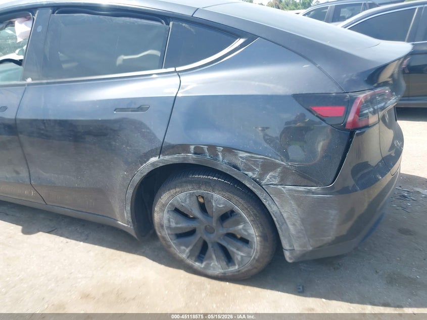 2025 Tesla Model y VIN 7SAYGDED5SA347359 IAAI salvage auction — REAR END, Original (Texas), sold $12,750 on 2026-07-30 (photo 6)