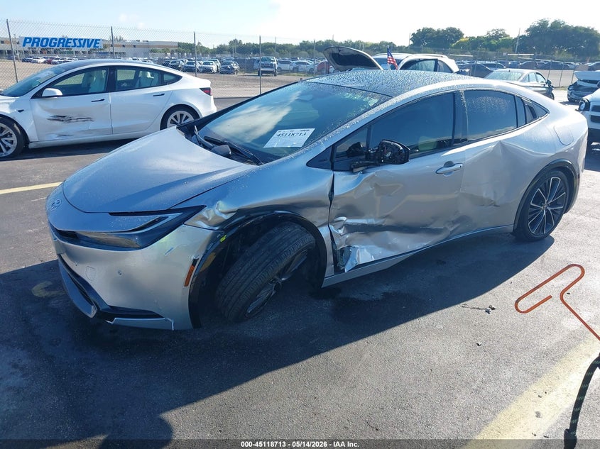 2025 Toyota Prius VIN JTDACAAU9S3063814 IAAI salvage auction — LEFT SIDE, Rebuildable (Florida), sold $9,700 on 2026-07-30 (photo 2)