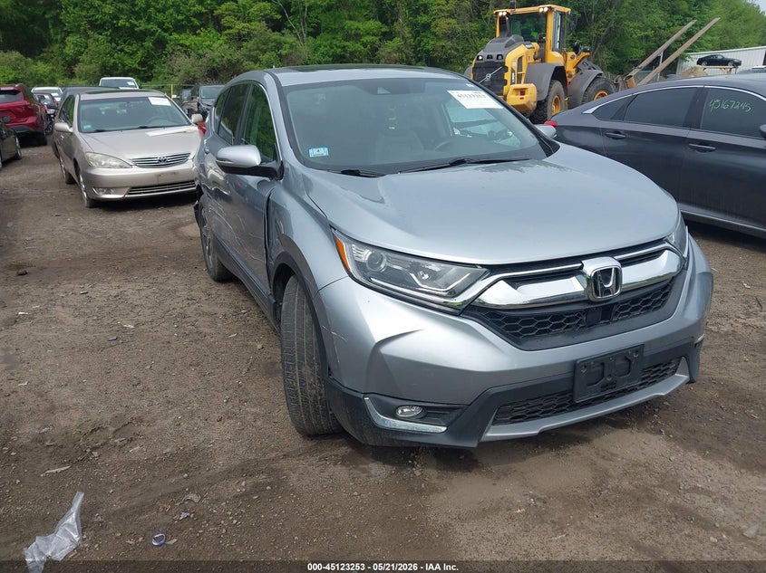 2018 Honda Cr-v VIN 7FARW1H8XJE025680 IAAI salvage auction — SIDE, Salvage (Massachusetts), sold $5,600 on 2026-07-25 (photo 1)