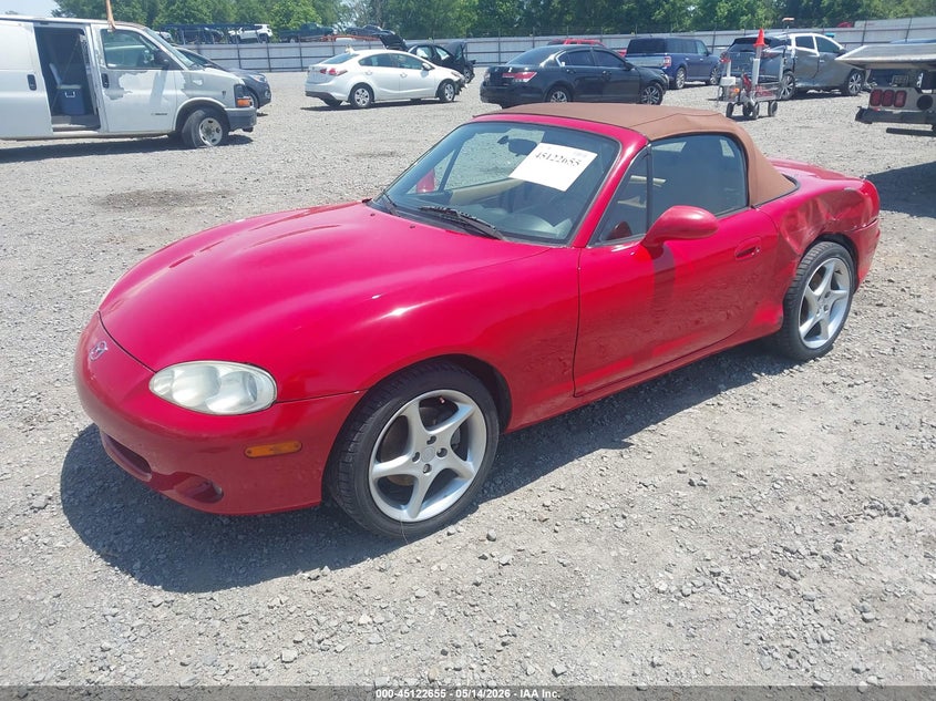 2001 Mazda Mx-5 miata VIN JM1NB353310205852 IAAI salvage auction — LEFT SIDE, Clear (Arkansas), sold $2,700 on 2026-07-15 (photo 2)