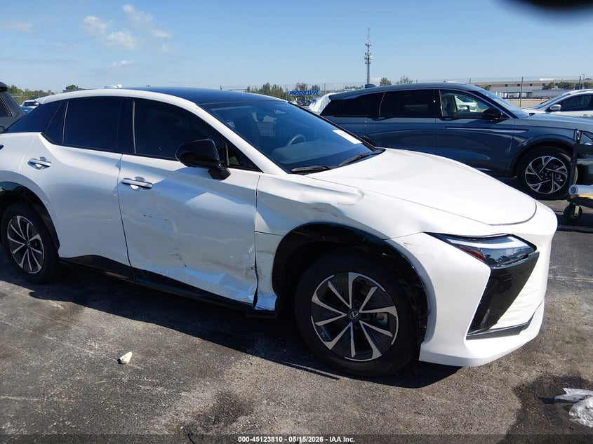 2024 Lexus Rz VIN JTJABABB7RA000472 IAAI salvage auction — SIDE, Rebuildable (Florida), sold $17,100 on 2026-07-16 (photo 6)