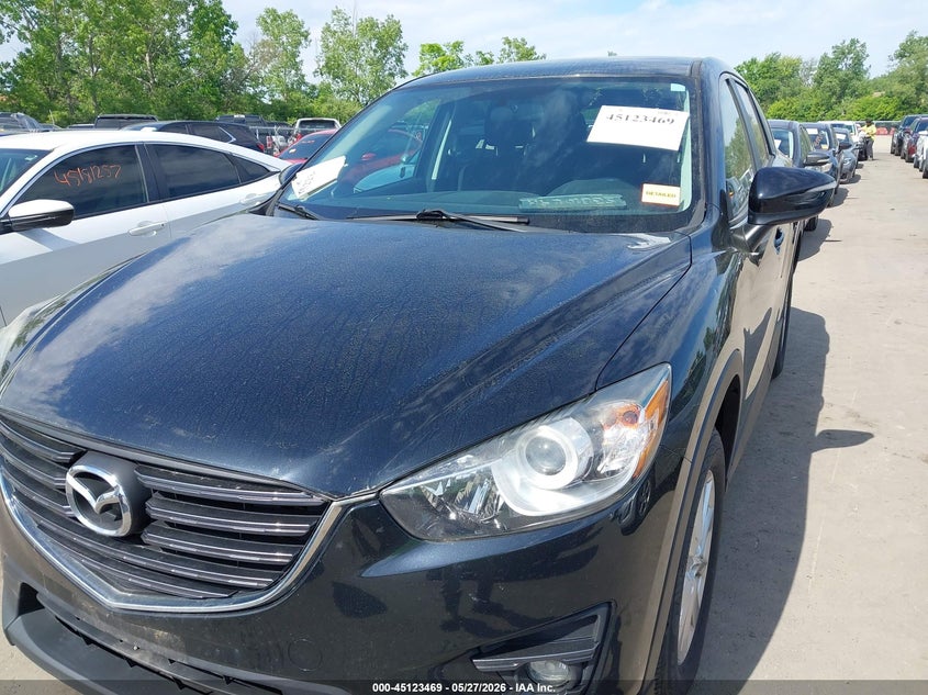 2016 Mazda Cx-5 VIN JM3KE4CY7G0721520 IAAI salvage auction — HAIL, Salvage (Ohio), sold $3,600 on 2026-07-07 (photo 6)