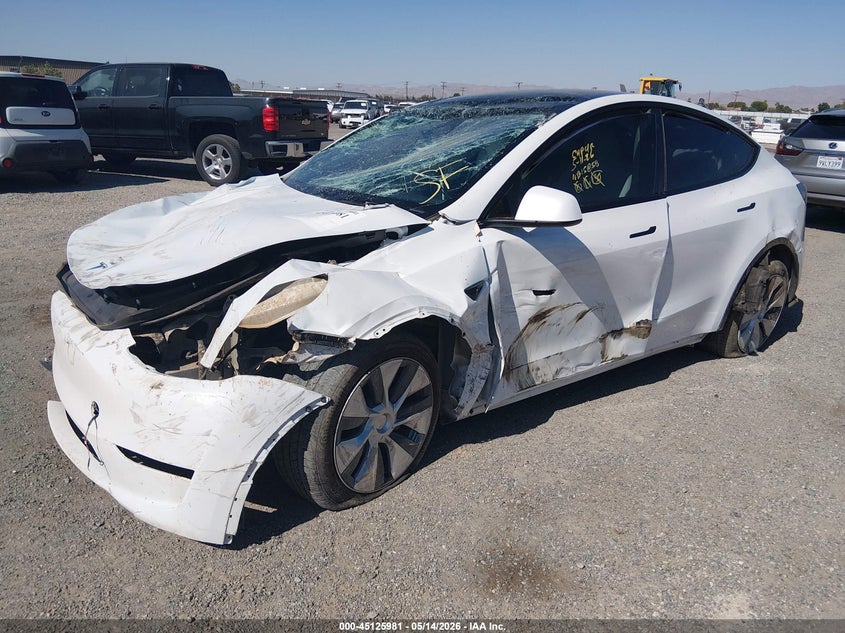2023 Tesla Model y VIN 7SAYGDEE1PA103207 IAAI salvage auction — ROLLOVER, Non-Repairable (California), sold $2,550 on 2026-07-17 (photo 2)