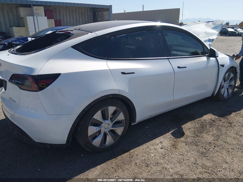 2023 Tesla Model y VIN 7SAYGDEE1PA103207 IAAI salvage auction — ROLLOVER, Non-Repairable (California), sold $2,550 on 2026-07-17 (photo 4)