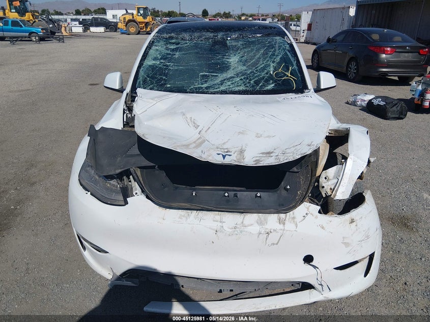 2023 Tesla Model y VIN 7SAYGDEE1PA103207 IAAI salvage auction — ROLLOVER, Non-Repairable (California), sold $2,550 on 2026-07-17 (photo 6)