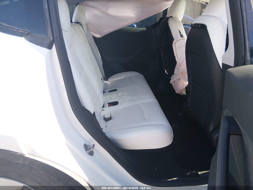 2023 Tesla Model y VIN 7SAYGDEE1PA103207 IAAI salvage auction — ROLLOVER, Non-Repairable (California), sold $2,550 on 2026-07-17 (photo 8)