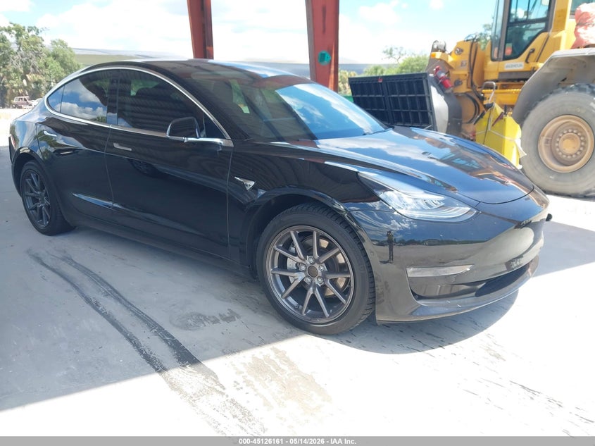 2019 Tesla Model 3 VIN 5YJ3E1EB9KF497021 IAAI salvage auction — REAR END, Rebuildable (Florida), sold $9,900 on 2026-07-09 (photo 1)