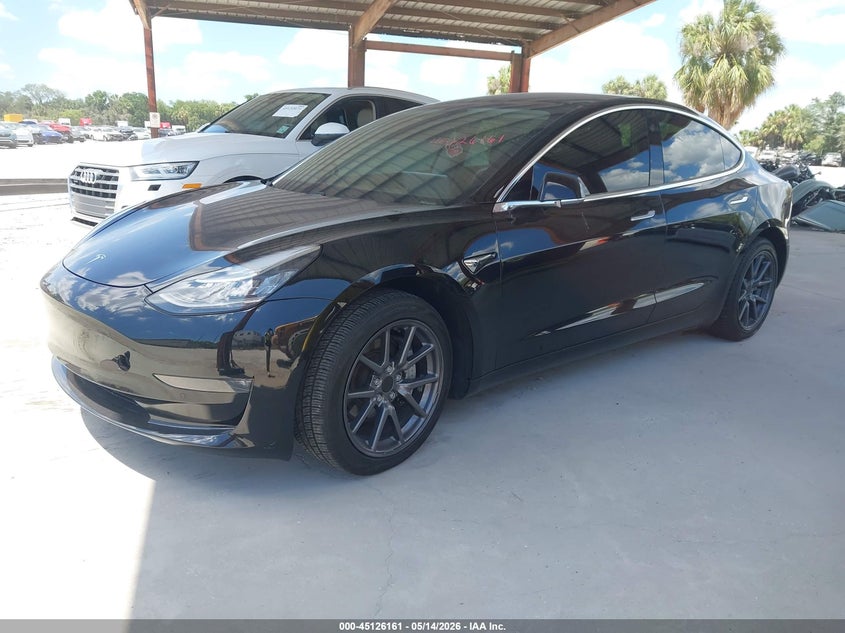 2019 Tesla Model 3 VIN 5YJ3E1EB9KF497021 IAAI salvage auction — REAR END, Rebuildable (Florida), sold $9,900 on 2026-07-09 (photo 2)
