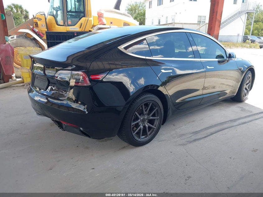 2019 Tesla Model 3 VIN 5YJ3E1EB9KF497021 IAAI salvage auction — REAR END, Rebuildable (Florida), sold $9,900 on 2026-07-09 (photo 4)