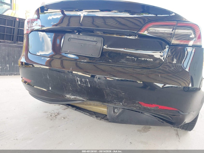 2019 Tesla Model 3 VIN 5YJ3E1EB9KF497021 IAAI salvage auction — REAR END, Rebuildable (Florida), sold $9,900 on 2026-07-09 (photo 6)