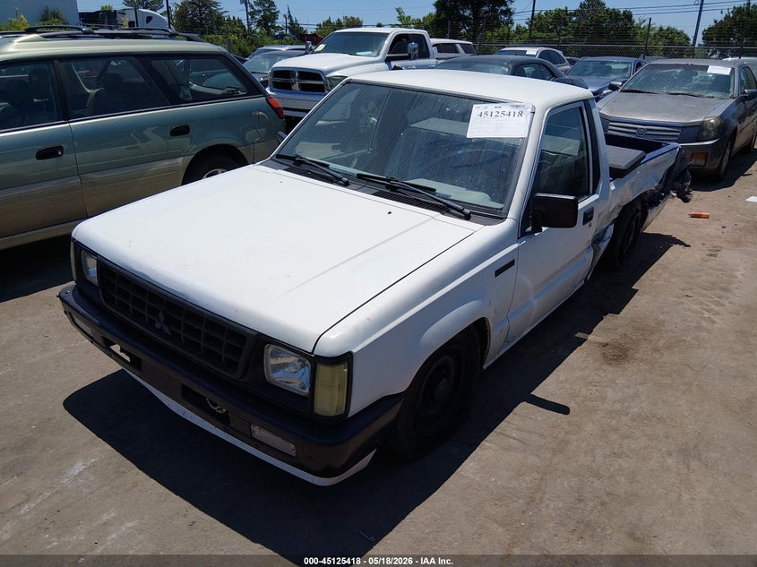 1991 Mitsubishi Mighty max / s VIN JA7FL24W1MP003088 IAAI salvage auction — LEFT SIDE, Salvage (North Carolina), sold $450 on 2026-07-29 (photo 2)