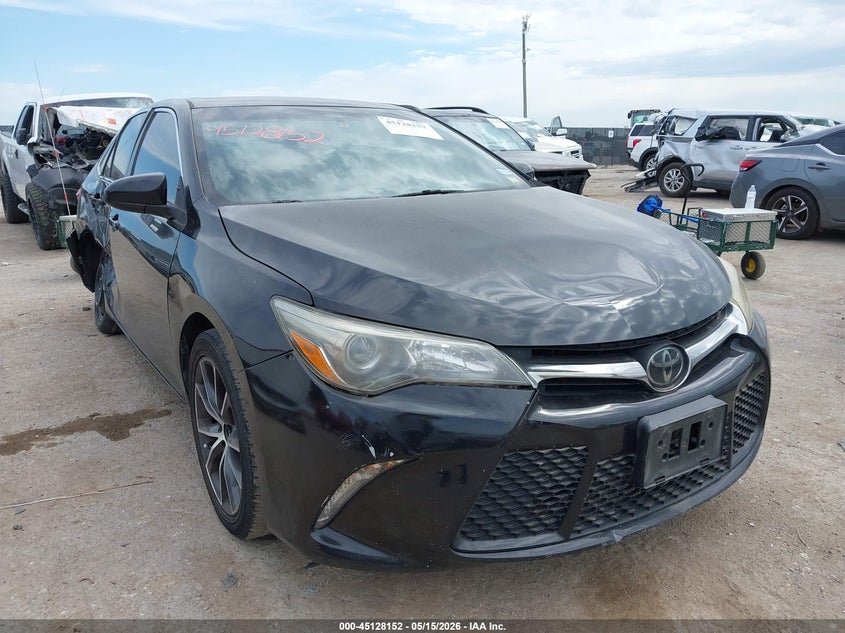 2015 Toyota Camry VIN 4T1BF1FK6FU477373 IAAI salvage auction — SIDE, Original (Texas), sold $2,000 on 2026-07-09 (photo 1)