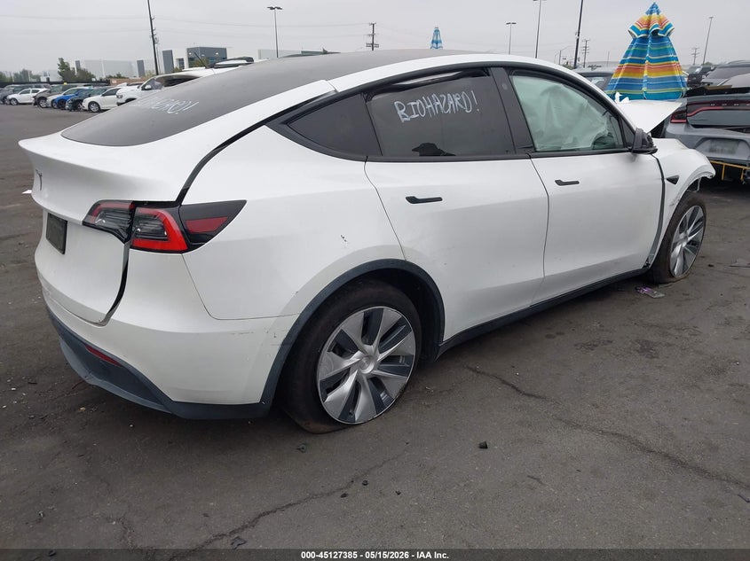 2021 Tesla Model y VIN 5YJYGDEEXMF064225 IAAI salvage auction — LEFT SIDE, Salvage Certificate (California), sold $3,350 on 2026-07-26 (photo 4)