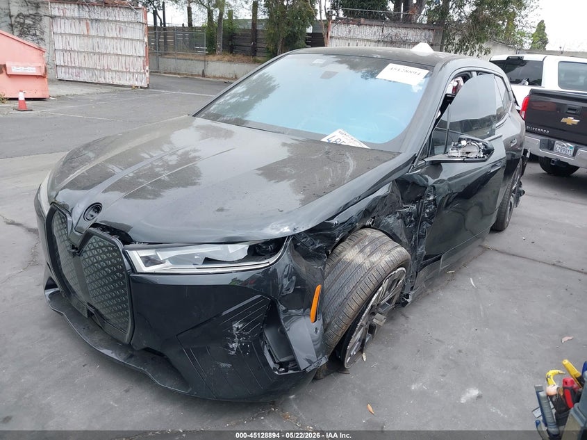 2023 BMW Ix VIN WB523CF06PCM54850 IAAI salvage auction — LEFT SIDE, Salvage Title, sold $11,650 on 2026-07-15 (photo 2)