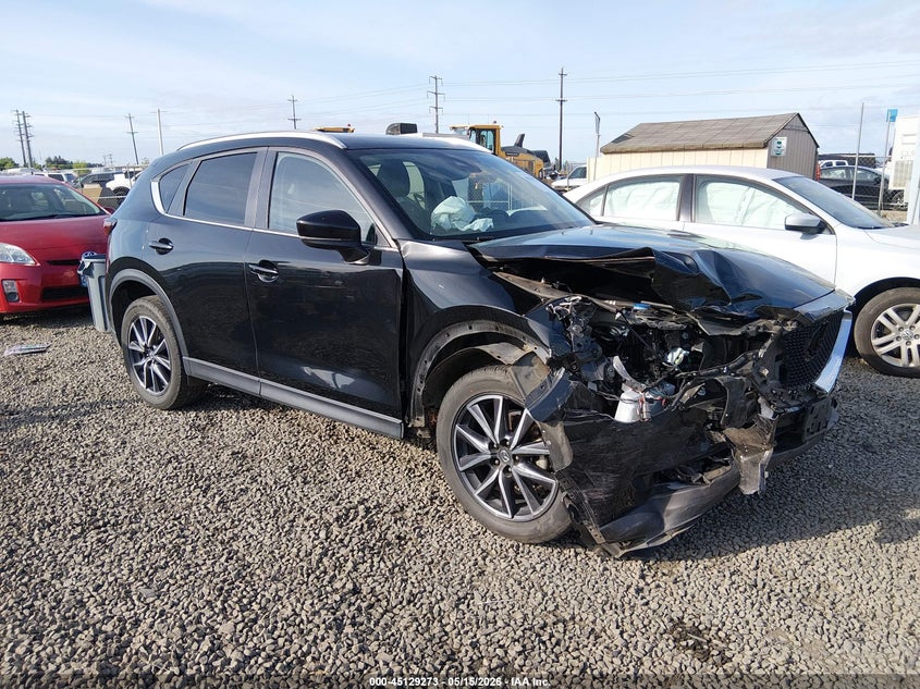 2018 Mazda Cx-5 VIN JM3KFBCM1J0438875 IAAI salvage auction — RIGHT FRONT, Salvage (Oregon), sold $2,650 on 2026-07-06 (photo 1)