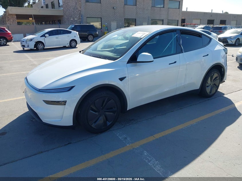 2026 Tesla Model y VIN 7SAYGDEDXTF425171 IAAI salvage auction — WATER/FLOOD, Salvage (California), sold $21,750 on 2026-07-20 (photo 2)