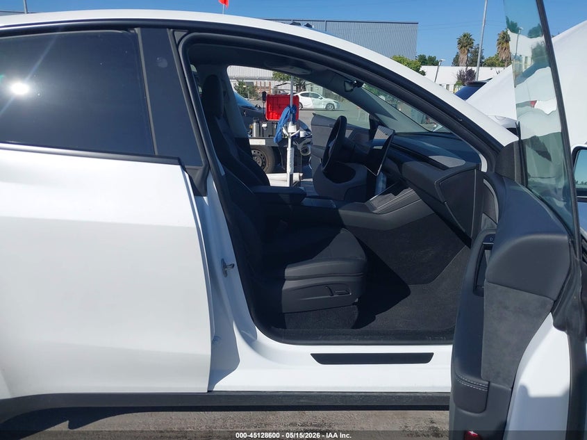 2026 Tesla Model y VIN 7SAYGDEDXTF425171 IAAI salvage auction — WATER/FLOOD, Salvage (California), sold $21,750 on 2026-07-20 (photo 5)