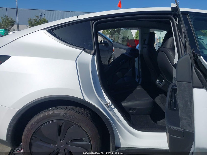 2026 Tesla Model y VIN 7SAYGDEDXTF425171 IAAI salvage auction — WATER/FLOOD, Salvage (California), sold $21,750 on 2026-07-20 (photo 8)