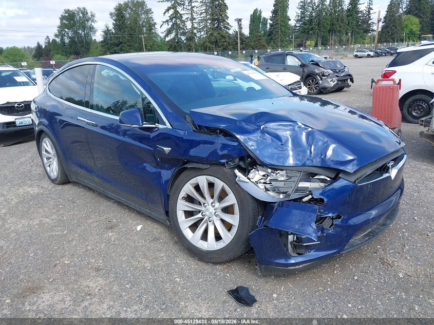2018 Tesla Model x VIN 5YJXCDE2XJF142415 IAAI salvage auction — RIGHT FRONT, Bill Of Sale (Washington), sold $4,350 on 2026-07-09 (photo 1)