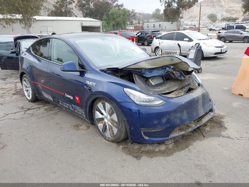 2023 Tesla Model y VIN 7SAYGDEE3PA115777 IAAI salvage auction — WATER/FLOOD, Salvage (California), sold $3,750 on 2026-07-28 (photo 1)