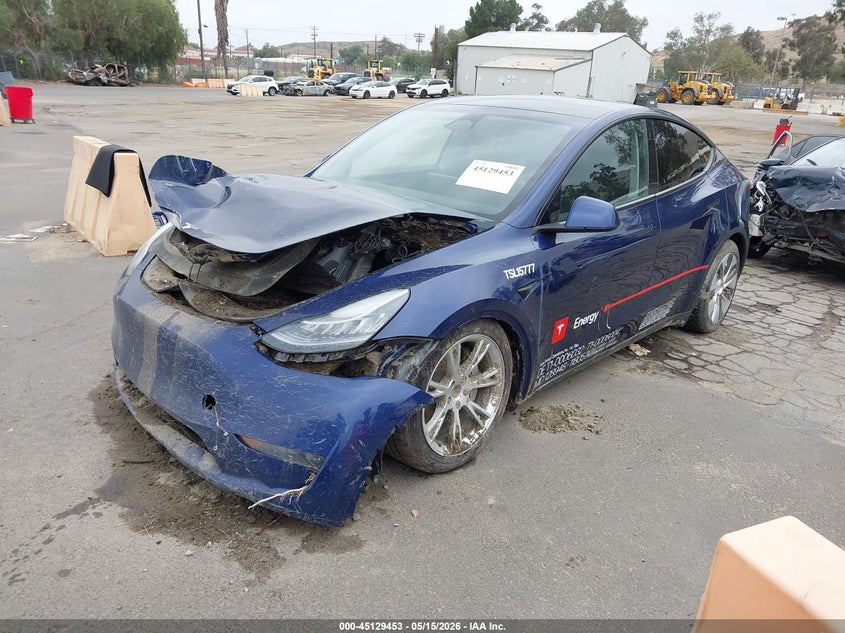 2023 Tesla Model y VIN 7SAYGDEE3PA115777 IAAI salvage auction — WATER/FLOOD, Salvage (California), sold $3,750 on 2026-07-28 (photo 2)