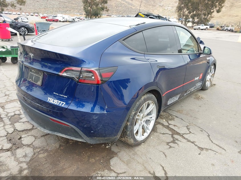 2023 Tesla Model y VIN 7SAYGDEE3PA115777 IAAI salvage auction — WATER/FLOOD, Salvage (California), sold $3,750 on 2026-07-28 (photo 4)