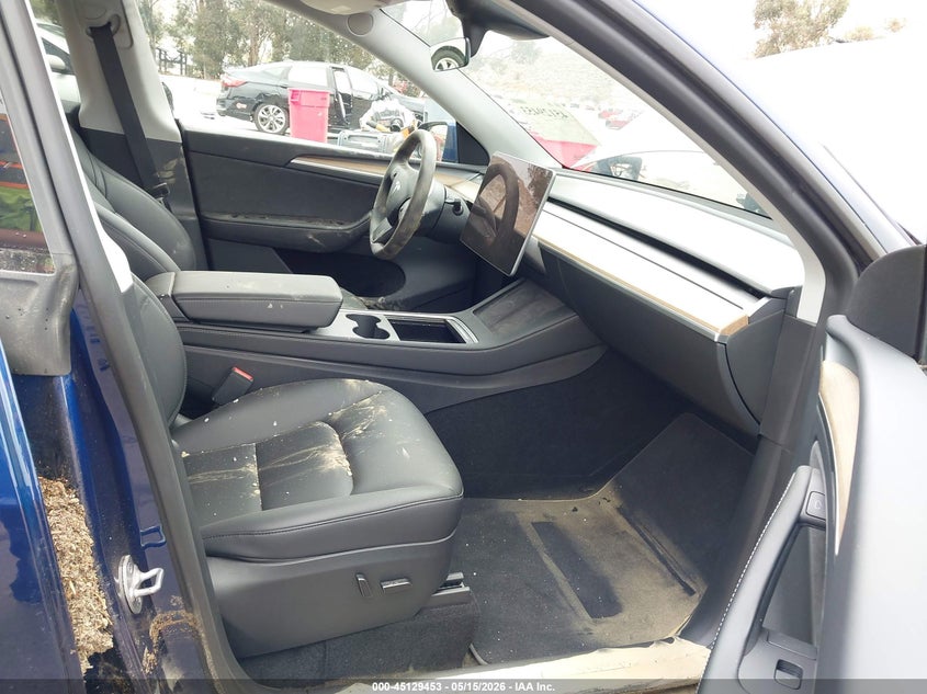 2023 Tesla Model y VIN 7SAYGDEE3PA115777 IAAI salvage auction — WATER/FLOOD, Salvage (California), sold $3,750 on 2026-07-28 (photo 5)