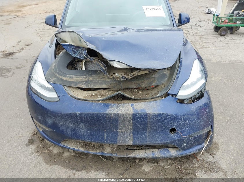 2023 Tesla Model y VIN 7SAYGDEE3PA115777 IAAI salvage auction — WATER/FLOOD, Salvage (California), sold $3,750 on 2026-07-28 (photo 6)