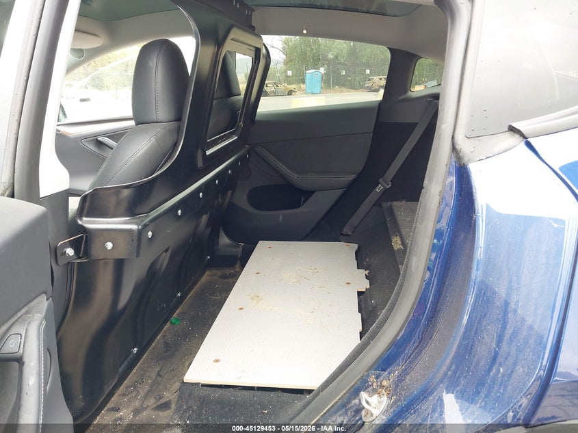 2023 Tesla Model y VIN 7SAYGDEE3PA115777 IAAI salvage auction — WATER/FLOOD, Salvage (California), sold $3,750 on 2026-07-28 (photo 8)