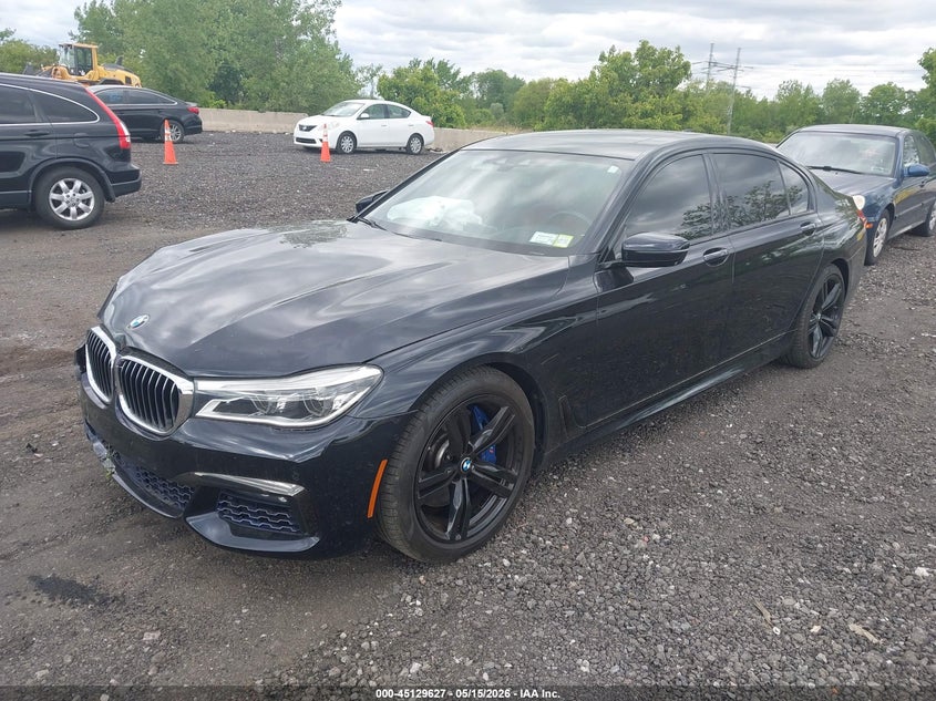 2018 BMW 7er VIN WBA7F2C51JG424941 IAAI salvage auction — RIGHT FRONT, Mv-907A (New York), sold $8,325 on 2026-07-14 (photo 2)