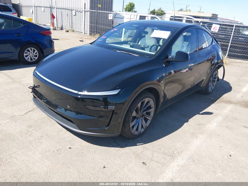 2026 Tesla Model y VIN 7SAYGDEE8TF605399 IAAI salvage auction — REAR END, Salvage (California), sold $23,650 on 2026-07-08 (photo 2)