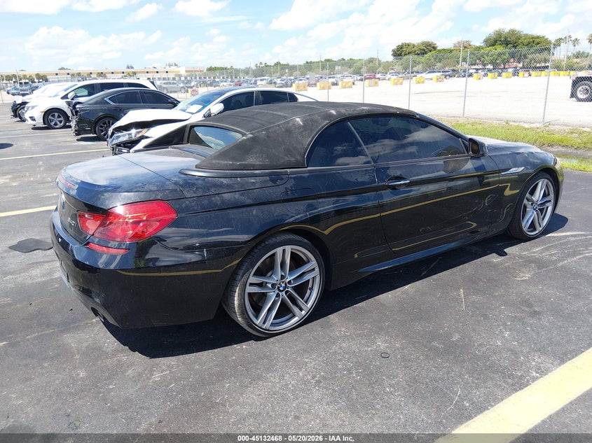 2014 BMW 6er VIN WBALW7C50EDX59028 IAAI salvage auction — WATER/FLOOD, Rebuildable (Florida), sold $1,900 on 2026-07-16 (photo 4)