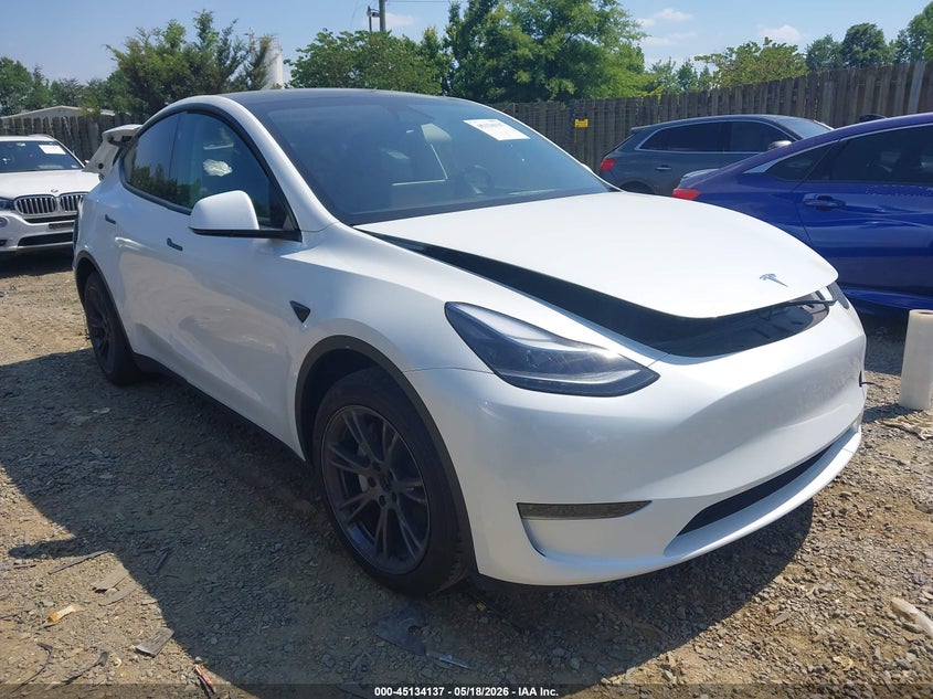 2024 Tesla Model y VIN 7SAYGDEDXRF205893 IAAI salvage auction — REAR END, Salvage Title, sold $9,300 on 2026-08-01 (photo 1)