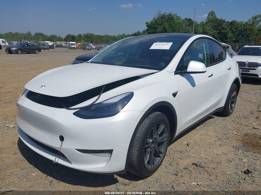 2024 Tesla Model y VIN 7SAYGDEDXRF205893 IAAI salvage auction — REAR END, Salvage Title, sold $9,300 on 2026-08-01 (photo 2)