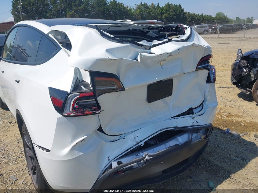 2024 Tesla Model y VIN 7SAYGDEDXRF205893 IAAI salvage auction — REAR END, Salvage Title, sold $9,300 on 2026-08-01 (photo 6)