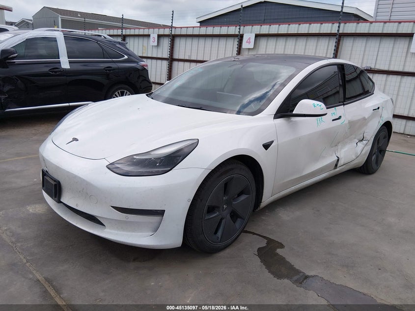 2022 Tesla Model 3 VIN 5YJ3E1EB4NF121671 IAAI salvage auction — LEFT SIDE, Original (Texas), sold $12,900 on 2026-07-14 (photo 2)