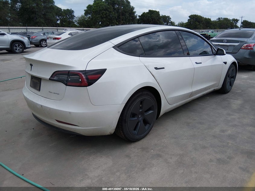 2022 Tesla Model 3 VIN 5YJ3E1EB4NF121671 IAAI salvage auction — LEFT SIDE, Original (Texas), sold $12,900 on 2026-07-14 (photo 4)